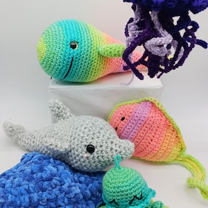 Under The Sea Stuffed Animals, purple pufferfish, rainbow dolphin, pastel beluga, bright tropical fish