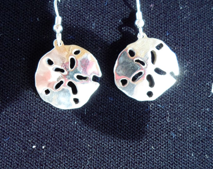 sand dollar earrings hand pierced originals sterling silver by Mountain man