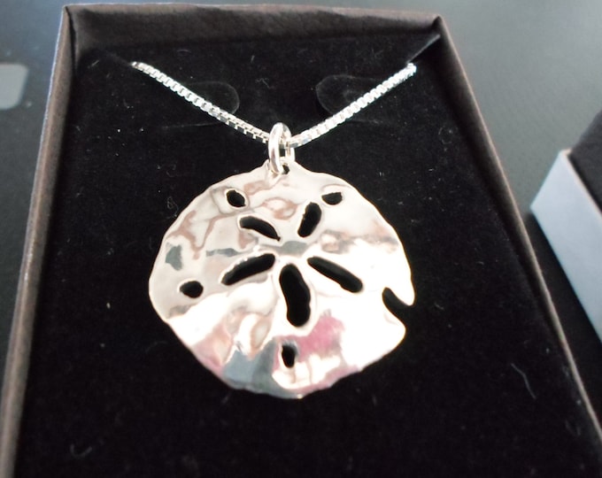 Sand dollar necklace hand pierced original by Mountain man  w/sterling silver chain