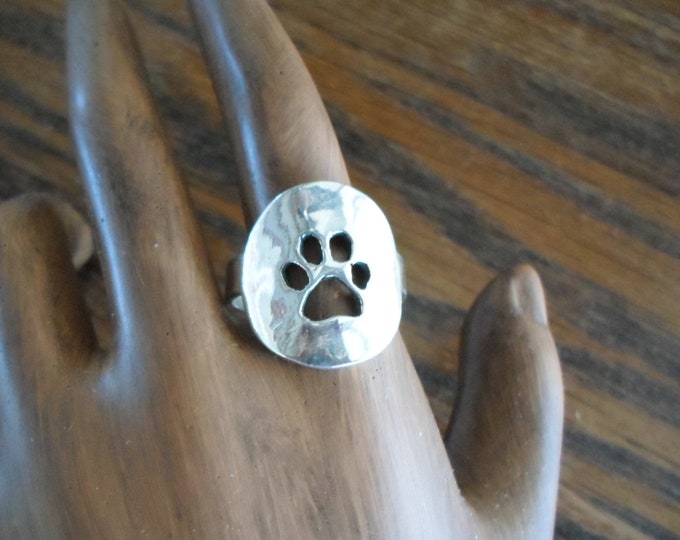 Dog paw ring dime size