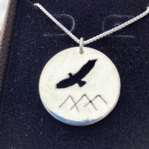 Hawk over mountains necklace