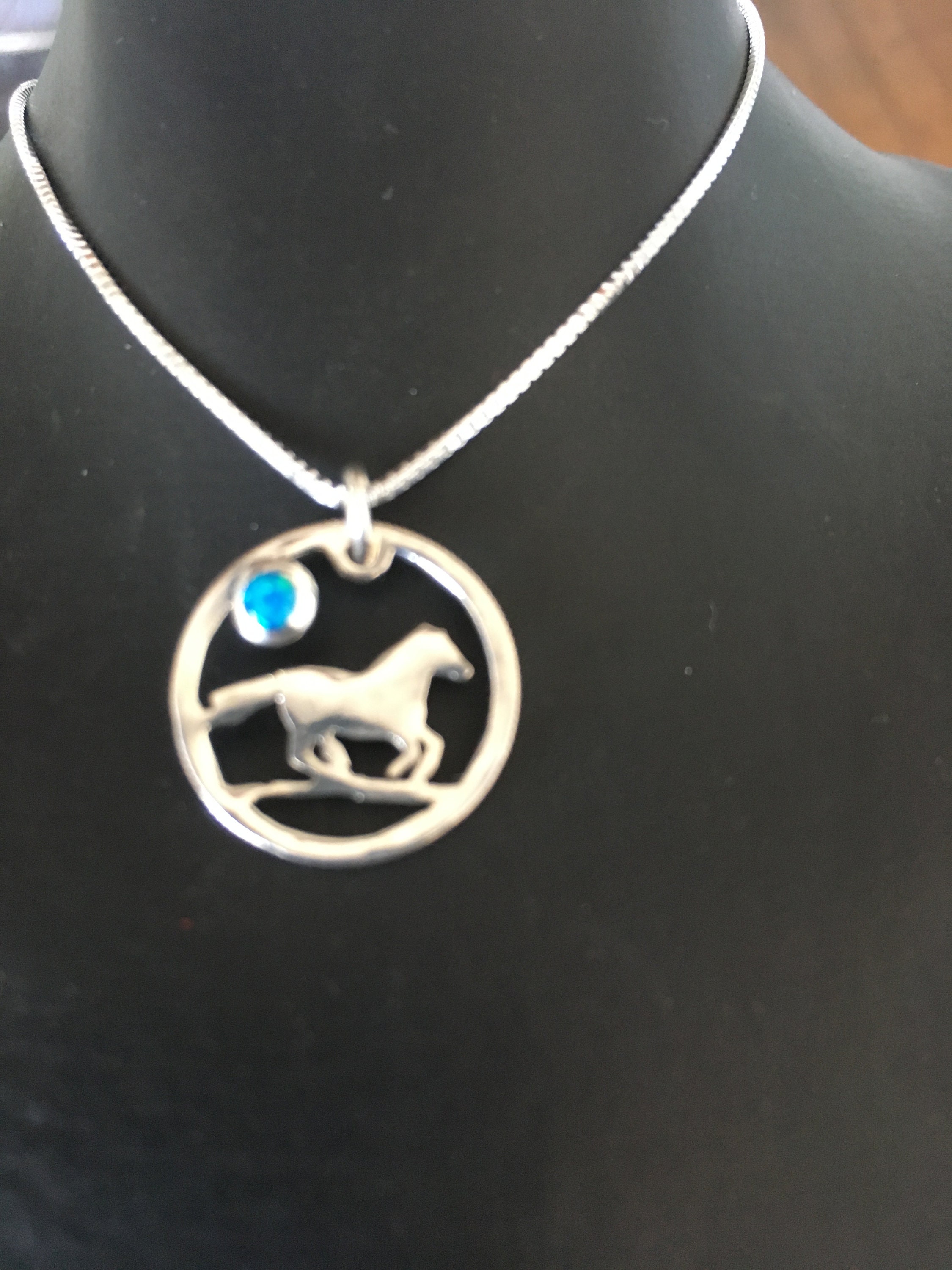 Horse necklace w/blue opal dime size w 