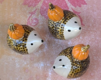 Hedgehog figurine. ONE hedgehog with pumpkin. Ceramic Thanksgiving hedgehog. Miniature Halloween hedgehog. Thanksgiving hedgehog.