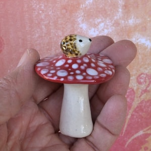Miniature ceramic mushroom. Hedgehog on mushroom. Miniature mushroom with a baby hedgehog. Pot decor.  Fairy garden decor. Amanita mushroom