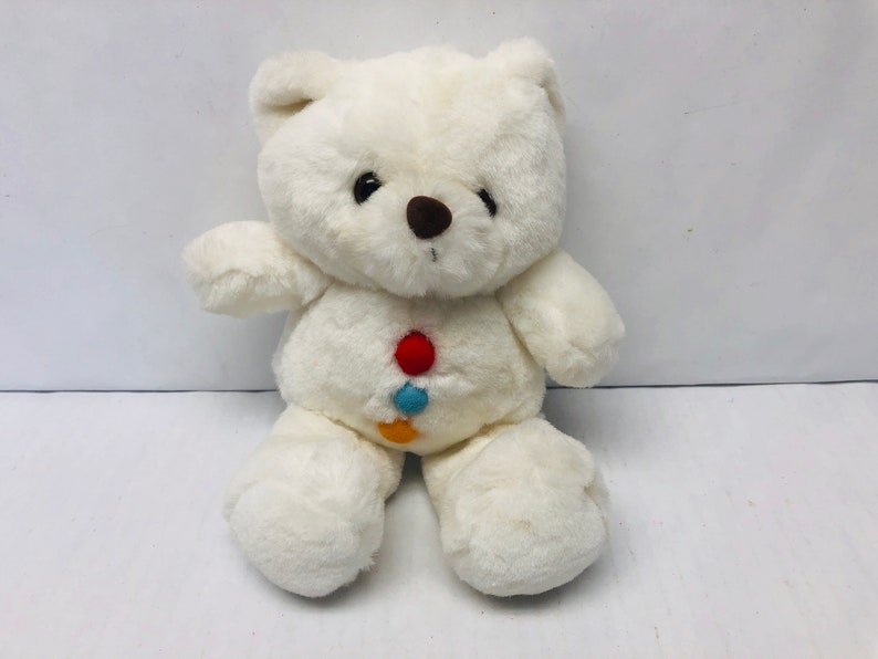 yellow and white teddy bear