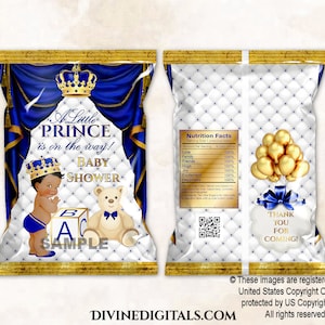 May include: Blue and gold baby shower favour bags with a crown, a teddy bear, and a baby boy. The bags have a white quilted background and the text "A Little Prince is on the way! Baby Shower".