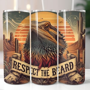 May include: A stainless steel tumbler with a colorful illustration of a bearded dragon in a desert landscape. The text "Respect the Beard" is written on a scroll in the image.