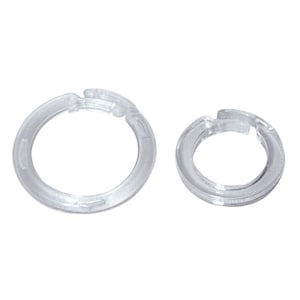May include: Two clear plastic rings, one larger than the other. The rings are smooth and have a slightly rounded edge.