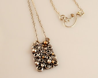 Handmade Sterling Silver Pendant Necklace: Mixed Metal Swirl Design