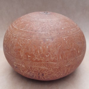 ancient Peruvian carved gourd