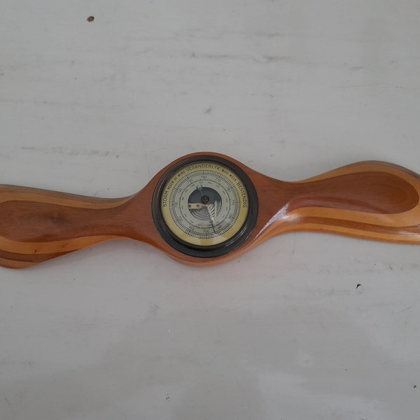 Vintage wooden propeller barometer