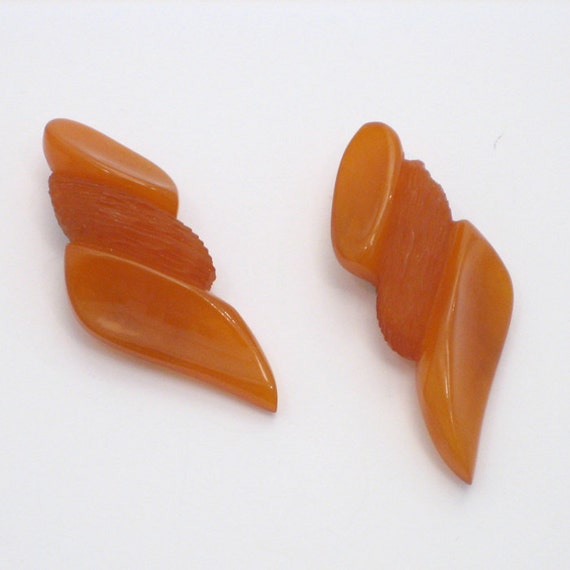 Orange Bakelite Dress Clips,1930s, USA