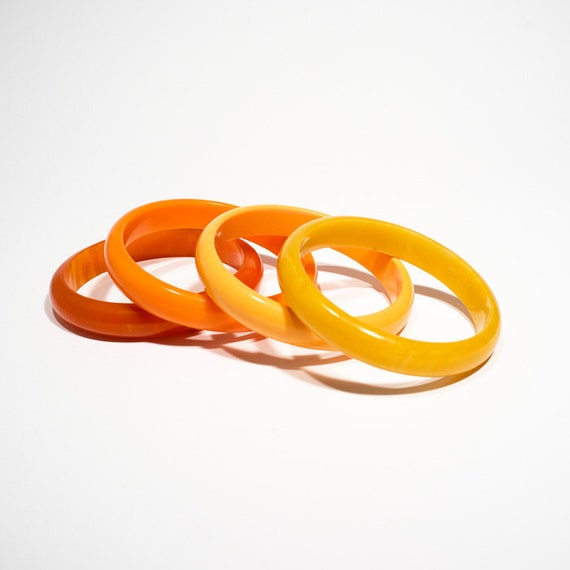 Set of four bakelite bracelets // 1940s USA // orange and | Etsy