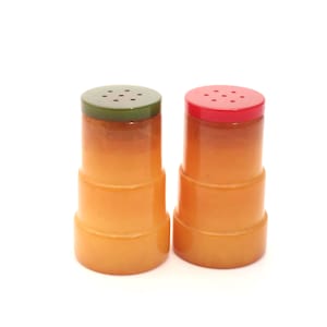Yellow Bakelite Salt and Pepper Shakers with a green and a red lid, 1940s, USA