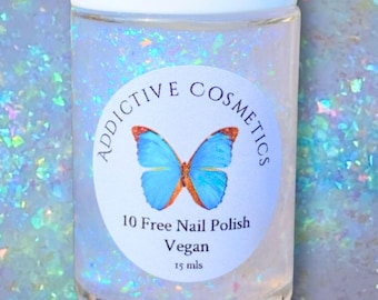 May include: A clear bottle of 10 Free Nail Polish by Addictive Cosmetics. The bottle has a blue butterfly sticker with the text "10 Free Nail Polish Vegan 15 mls".