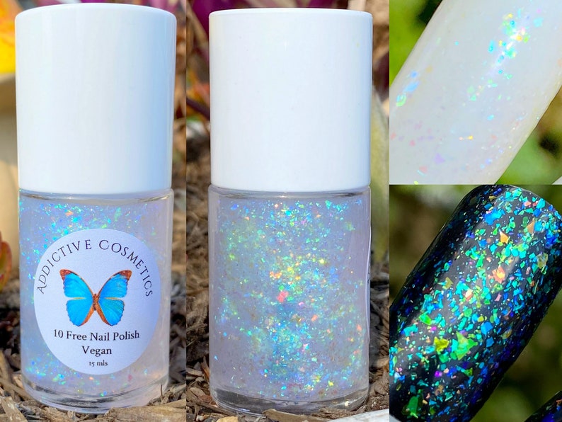 May include: A clear glass bottle of iridescent nail polish with a white cap. The bottle has a label that says "Addictive Cosmetics" and "10 Free Nail Polish Vegan 15 mls". The polish is a light blue color with iridescent glitter.