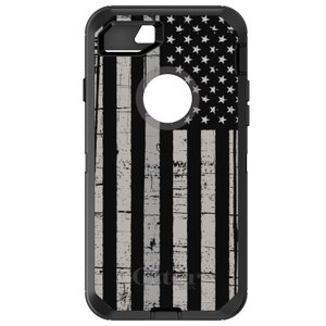 May include: Black and gray OtterBox phone case with a distressed American flag design.