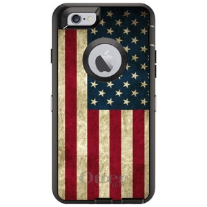 May include: A black OtterBox Defender Series case for an iPhone with a distressed American flag design.