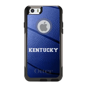 May include: A blue and black phone case with a basketball pattern and the word "KENTUCKY" in white text. The case is made by OtterBox.