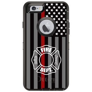 May include: Black OtterBox Defender Series phone case with a red line down the center and a white firefighter emblem with the words "FIRE DEPT." on a gray and white American flag background.