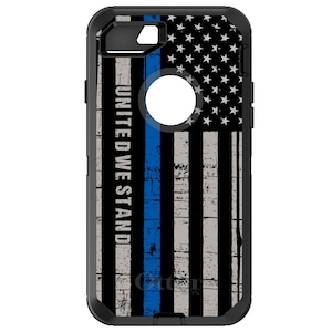 May include: Black phone case with a distressed American flag design and a blue line down the center. The text "United We Stand" is printed on the left side of the case.