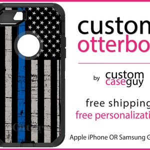 May include: A black Otterbox phone case with a distressed American flag design and a blue line down the center. The text "custom otterbox by caseguy" is printed below the image. The text "free shipping free personalization" is printed below the text. The text "Apple iPhone OR Samsung Galaxy" is printed below the text.