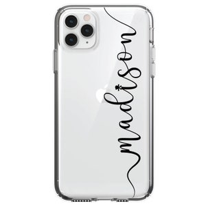 May include: A clear phone case with a black cursive design that says "madison" on the back.