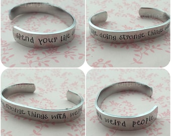 Hand Stamped Cuff, "spend your life doing strange things with weird people.", custom, personalised