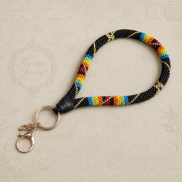 Black Matte Beaded Wristlet Keychain – Boho Ethnic Bead-Crochet Accessory with Golden & Colorful Accents