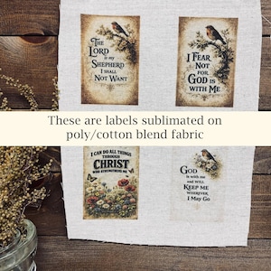 May include: Four rectangular labels with religious quotes and bird illustrations are displayed on a light-colored fabric. The labels include phrases like "The Lord is my Shepherd" and "I Fear Not". The text "These are labels sublimated on poly/cotton blend fabric" is also present.