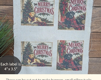 May include: A beige fabric panel featuring four printed rectangular labels, each measuring 4 inches by 3.5 inches. The labels display illustrations of yellow and black Labrador dogs wearing red plaid scarves, pine trees, and the text Merry Christmas.