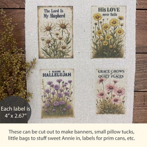 May include: A rectangular piece of light-colored fabric featuring four printed floral designs with text. Each label measures 4 inches by 2.67 inches. The designs include white daisies with 'The Lord Is My Shepherd', yellow flowers with 'His LOVE NEVER FAILS', purple flowers with 'I RAISE A HALLELUJAH', and pink flowers with 'GRACE GROWS IN QUIET PLACES'.