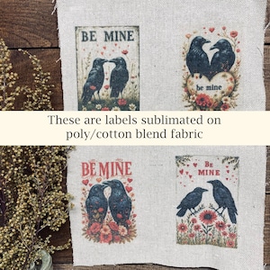 May include: Four fabric labels with raven illustrations and the text "BE MINE". The labels are printed on a poly-cotton blend fabric. The labels feature heart and floral designs.