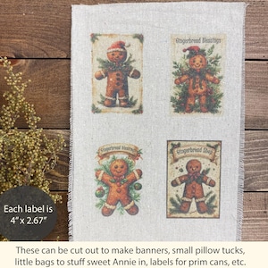 May include: A rectangular piece of light beige fabric featuring four printed gingerbread man illustrations. Each label measures 4 inches by 2.67 inches. The designs include gingerbread figures with festive greenery, bows, and text reading Gingerbread Blessings and Gingerbread Shop.