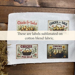 May include: Four rectangular labels with the text "Chicks for Sale" and images of chicks in baskets. The labels are printed on a cotton blend fabric. The labels have a vintage, rustic style.