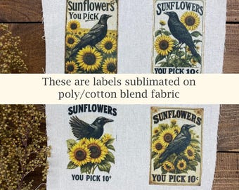 May include: Four rectangular labels featuring a vintage design of sunflowers and a black crow. The labels read "Sunflowers, You Pick 10¢". The text "These are labels sublimated on poly/cotton blend fabric" is also present.