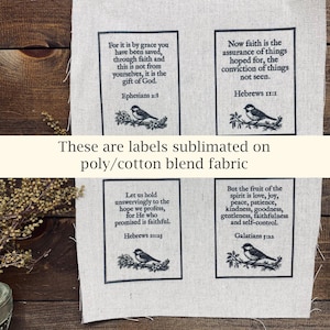 May include: Four rectangular labels printed on poly/cotton blend fabric. Each label features a Bible verse and a black and white illustration of a bird on a branch. The text includes verses from Ephesians, Hebrews, and Galatians.