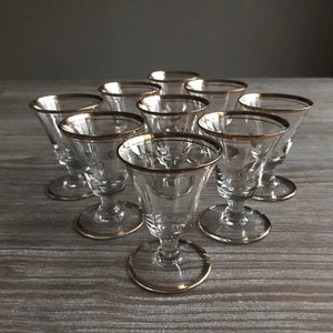 Vintage vodka shot glasses with gold trim, Set of 9, Vintage Mid century barware, Glass for Cognac Sherry Liqueur,Clear glass, iconic design