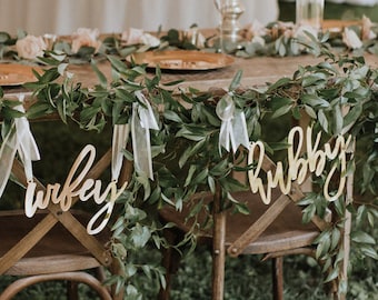 bride and groom chair sign