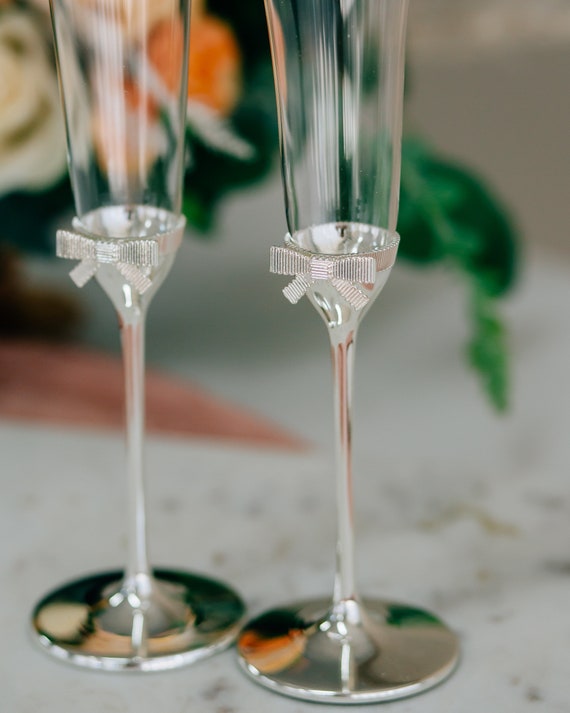 AOOE Champagne flutes glass Set of 4,Hand Blown Crystal Wedding Flutes  Glasses,Perfect for Christmas…See more AOOE Champagne flutes glass Set of