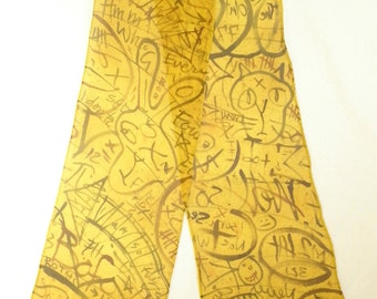 Long Skinny Chiffon Scarf - Brown doodles on mustard gold background