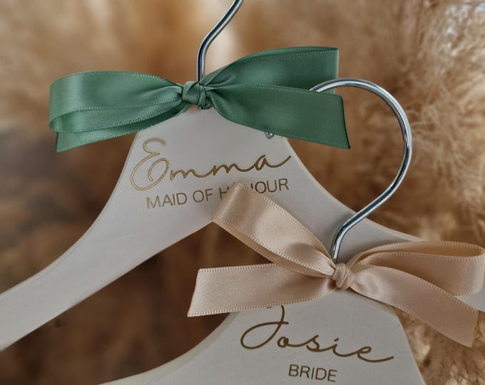 Featured listing image: New 2025 Ribbon Bow Personalised Wedding Hangers |Bridal party gift |Bride Wedding Hanger | Custom Vinyl Hanger Wedding day hanger