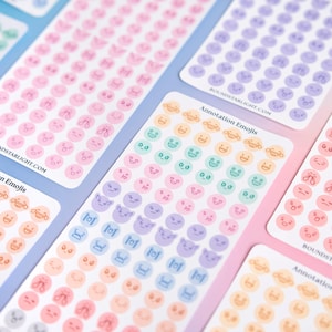 May include: Multiple rectangular sticker sheets labeled Annotation Emojis, featuring rows of small circular icons with various facial expressions in pastel colors including pink, orange, green, purple, and blue, with the text BOUNDSTARLIGHT.COM.