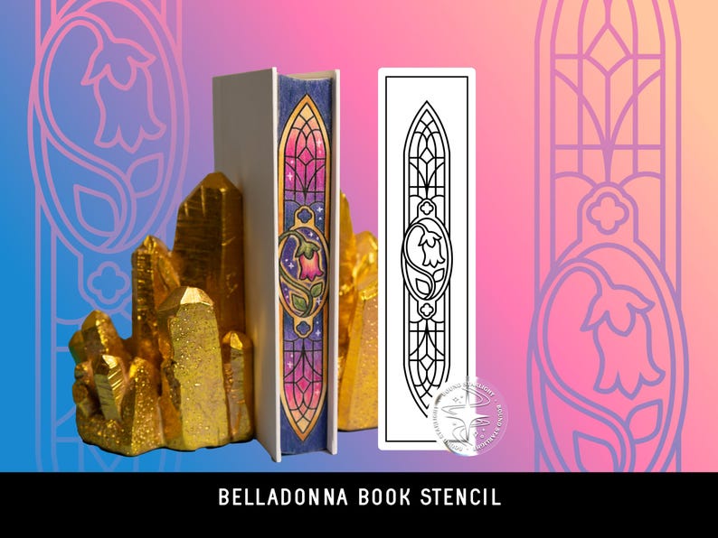 May include: A white book with a stained glass-style floral design on the spine, positioned between two gold crystal-shaped bookends. Next to the book is a rectangular stencil featuring a black line drawing of the same floral pattern.