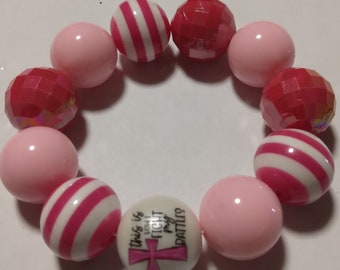 Pink and white breast cancer awareness bracelet