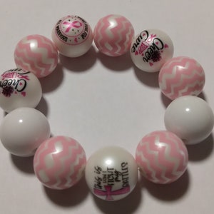 Pink and white awareness bracelet