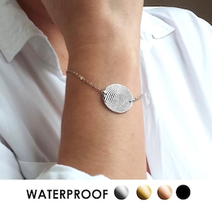 Fingerprint bracelet, personalized delicate disc memorial thumbprint bracelet for woman, custom engraved cremation jewelry.