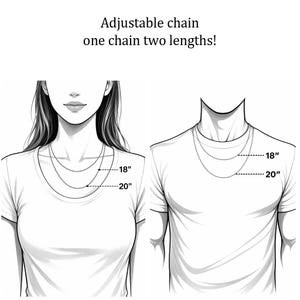 May include: A black and white line drawing of an adjustable chain shown on two figures. The text reads: Adjustable chain one chain two lengths! The illustration indicates two distinct lengths of 18 inches and 20 inches for the necklace chain.