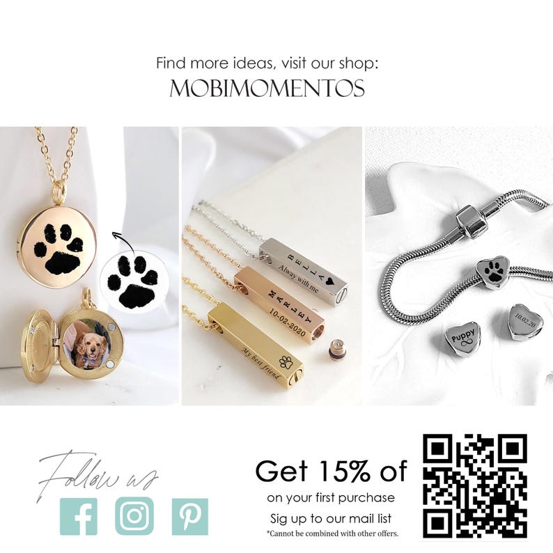 May include: A collection of gold and silver-toned jewelry including round lockets with paw prints and photos, rectangular bar pendants engraved with names and dates, and heart-shaped charms on a snake chain, featuring the text MOBIMOMENTOS.