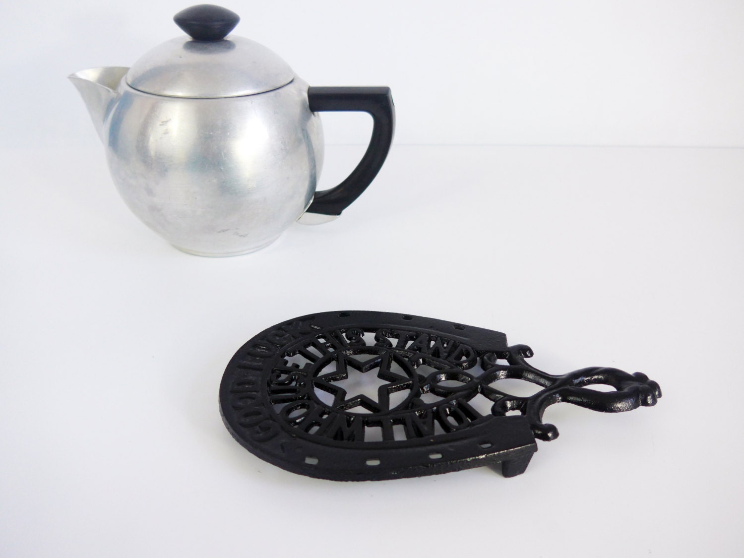 Vintage Black Cast Iron Trivet Good Luck Stamped JZH 1950